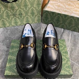 Gucci Black Leather Loafers with Gold Bit Detail
